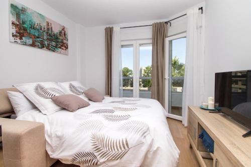 Vistamarina B208 By Ivi Real Estate Apartment ตอร์เรโมลิโนส ภายนอก รูปภาพ